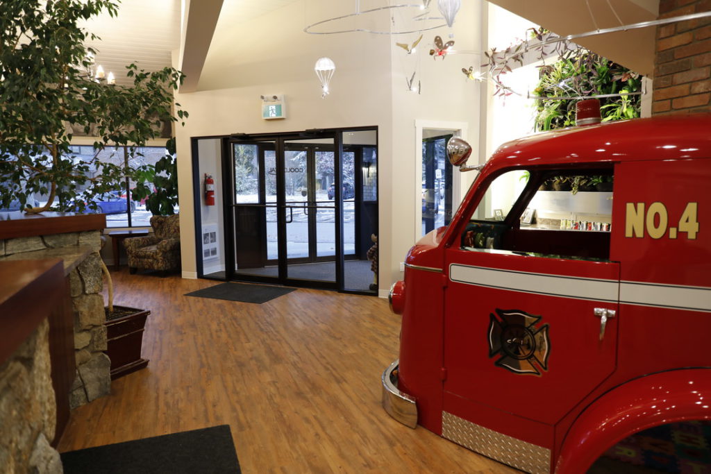 Photo of The Waiting room of Cool Dental, Complete With Restored Fire Truck.