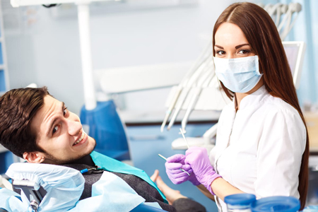 patient at dentist getting a dental crown