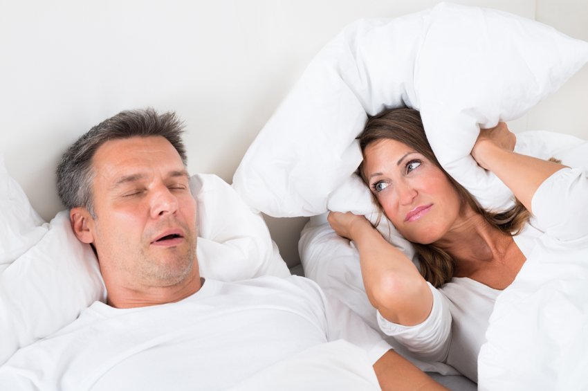 man with sleep apnea keeping wife awake