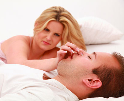 wife being bothered by husband's snoring