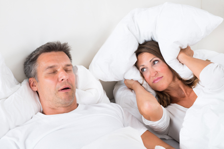 wife awake from husbands sleep apnea
