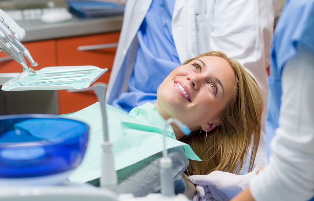 woman getting sedation at the dentist